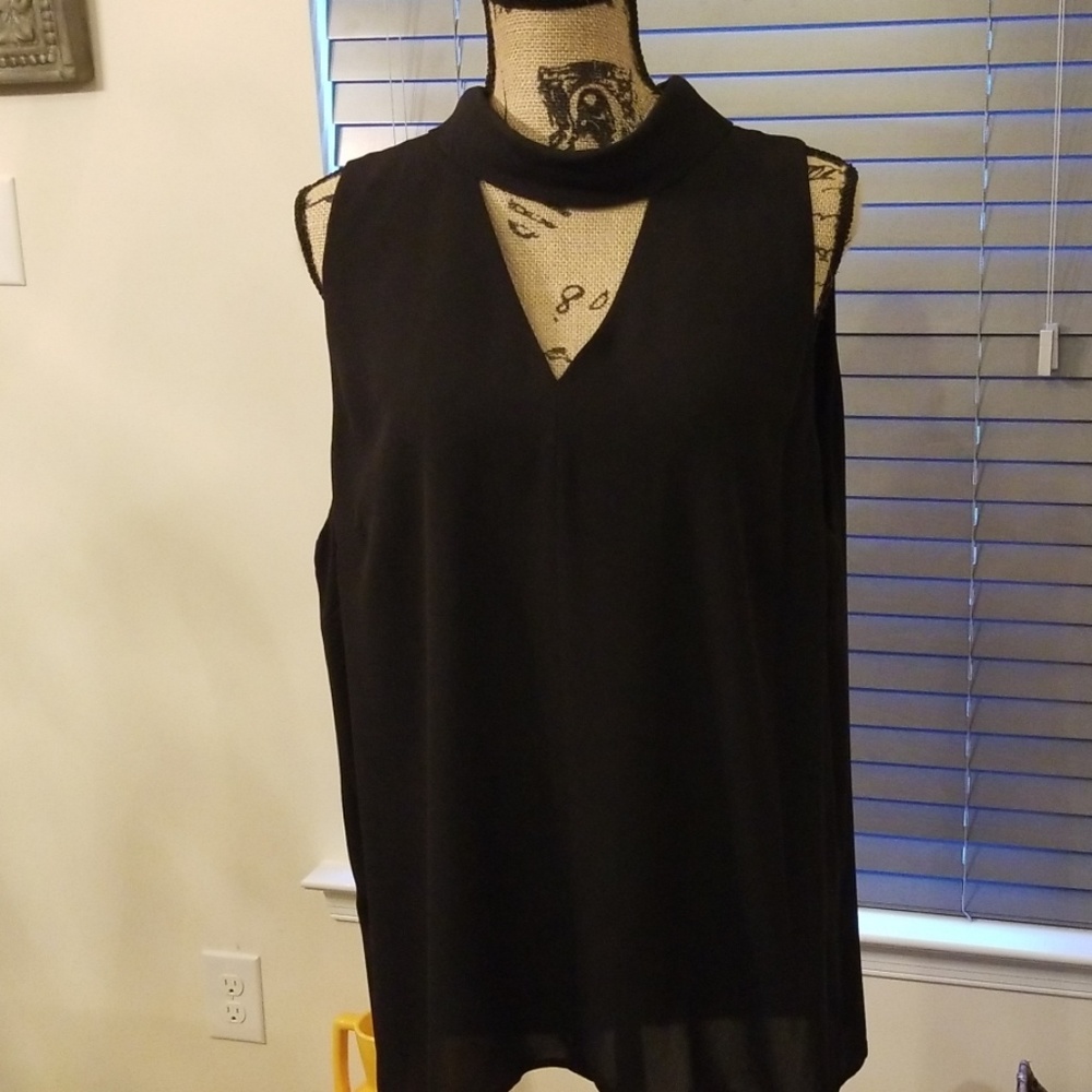 Sexy black top. Sleeveless.